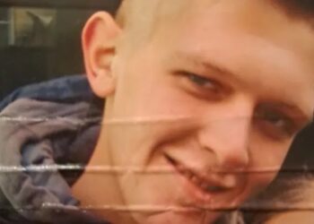 First photo of young Scots man slain in Glasgow street as arrest is made.