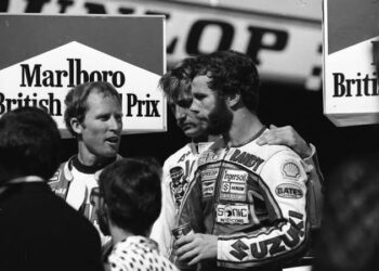 Historic Victory: Jack Middelburg Stands Victorious at the 1981 British GP Podium with Legends Kenny Roberts and Randy Mamola