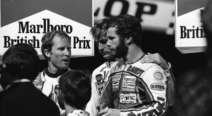 Historic Victory: Jack Middelburg Stands Victorious at the 1981 British GP Podium with Legends Kenny Roberts and Randy Mamola