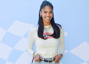 Natalia Bryant Channels USC-Student Glam in Chic Tie and Collared Shirt Look