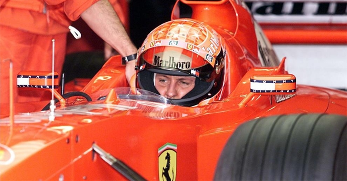 Sir Jackie Stewart to Wear Helmet Signed by Michael Schumacher, Kimi Räikkönen, and F1 Legends for Charity